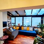 Modern Duplex With Sunny Rooftop Oasis!